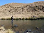 Warren Fishing A Long Pool