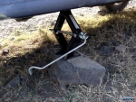 Two jacks and a few rocks later, and we got the tyre changed