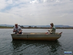 Neill and Alan fishing a private water