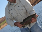 Nick with a fish at Lake Ringstead