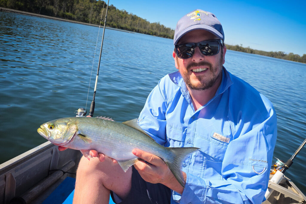 Warren with a tailor at Lake Conjola
